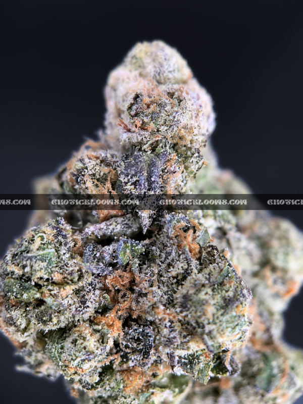 Sandstorm strain buds covered in frosty white trichomes, perfect for Washington DC and Virginia cannabis delivery customers seeking top-shelf indica flower.