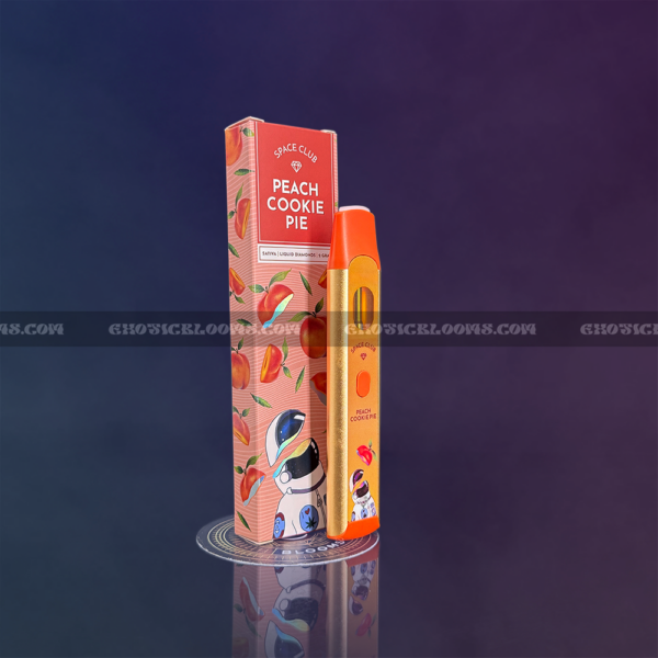 Space Club Peach Cookie Pie disposable vape pen with packaging, available for cannabis delivery in Washington DC, Arlington, and Alexandria.