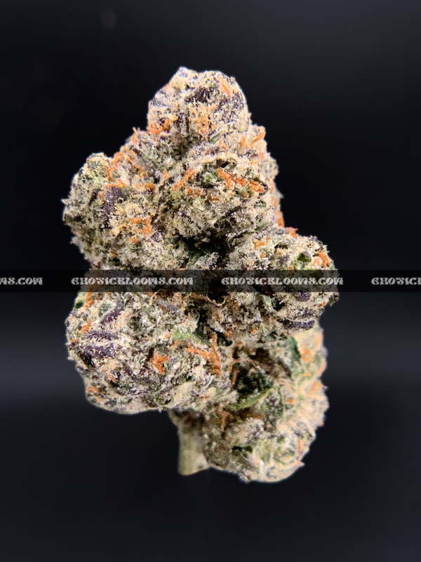 Lemonhead OG strain with zesty lemon aroma, golden trichomes, and sativa-dominant effects, available for cannabis delivery in DC and Virginia.