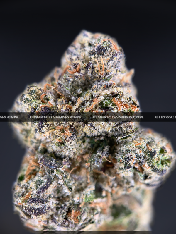 Lemonhead OG strain with zesty lemon aroma, golden trichomes, and sativa-dominant effects, available for cannabis delivery in DC and Virginia.