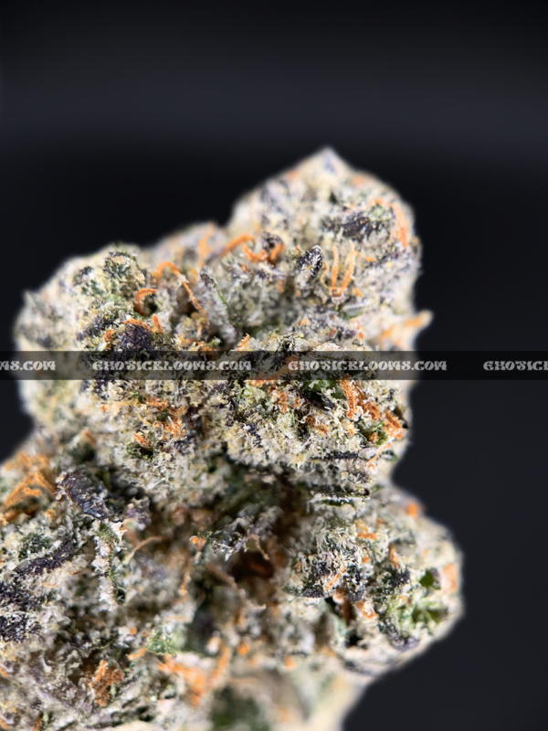 Lemonhead OG strain with zesty lemon aroma, golden trichomes, and sativa-dominant effects, available for cannabis delivery in DC and Virginia.