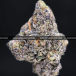 Close-up of Pink Ice Cream Cake cannabis strain flower, dense buds with trichomes, available for weed delivery in DC, Virginia, and Richmond