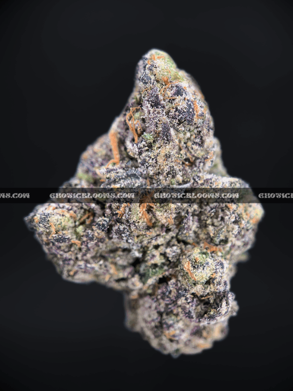 Close-up of Pink Ice Cream Cake cannabis strain flower, dense buds with trichomes, available for weed delivery in DC, Virginia, and Richmond