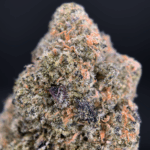 Dry Ice strain dense olive-green buds with pink-tinted trichomes, delivering 25–26% THC. Available for cannabis delivery in Washington DC, Virginia, Maryland, and Richmond.