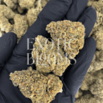 Pineapple Dragon cannabis strain with 27–29% THC. Oversized frosty green buds with orange hairs and tropical pineapple aroma. Available for weed delivery in Washington DC, Virginia, Maryland, and Richmond.