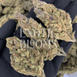 Strawberry Jack cannabis strain with 23–25% THC. Large frosty mint-green buds with amber hairs and strawberry aroma. Available for weed delivery in Washington DC, Virginia, Maryland, and Richmond.