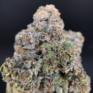 Cake Face hybrid cannabis strain with 27–30% THC, vanilla cake aroma, and euphoric balanced effects, available for weed delivery in Washington DC, Northern Virginia, Richmond, and Maryland via Exotic Blooms.