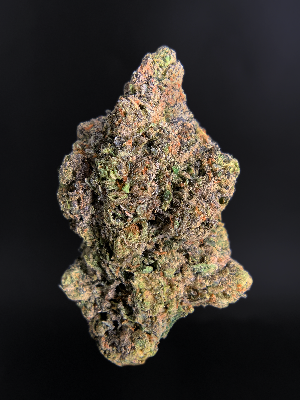 Pink Monet hybrid cannabis strain with 26–30% THC, sweet cherry aroma, purple-green buds, and uplifting yet relaxing effects, available for weed delivery in Washington DC, Northern Virginia, Richmond, and Maryland via Exotic Blooms.