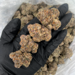 Smashberry Fumez indica dominant cannabis strain with purple frosty buds available at Exotic Blooms Washington DC weed delivery